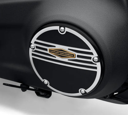 Silver circle derby cover with black detailed and gold Harley-Davidson logo